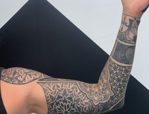 Traditional Black and White Arm Sleeve Tattoo