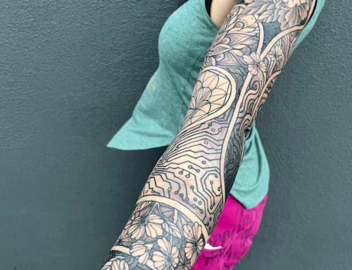 Traditional Floral Arm Sleeve Tattoo